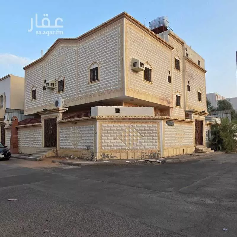 عمارة 394 م² في العزيزية 2