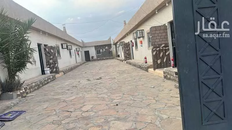 عمارة للبيع في شارع محمد بن علي الحنفي, حي القيروان, مدينة خميس مشيط, منطقة عسير 1 صورة