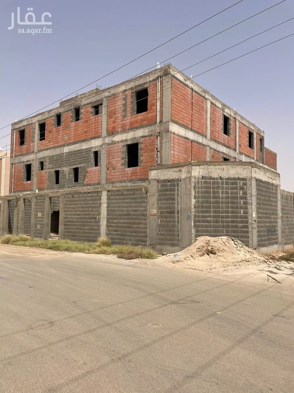 عمارة للبيع في شارع فيصل بن عبدالعزيز, حي الورود, مدينة المزاحميه, منطقة الرياض 1 صورة