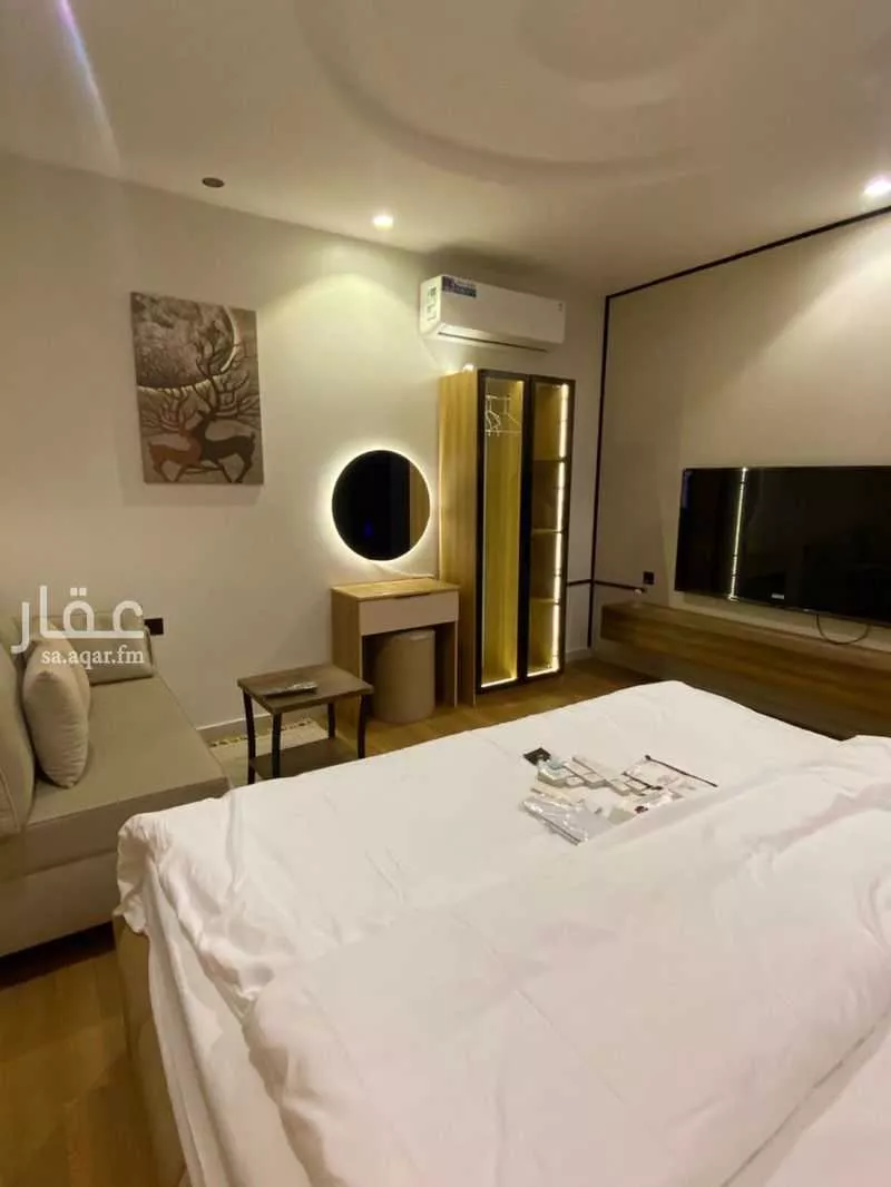 شقة مفروشة للحجز في شارع حميد ابن نافع ، حي الاناهي ، المدينة المنورة ، منطقة المدينة المنورة 1 صورة