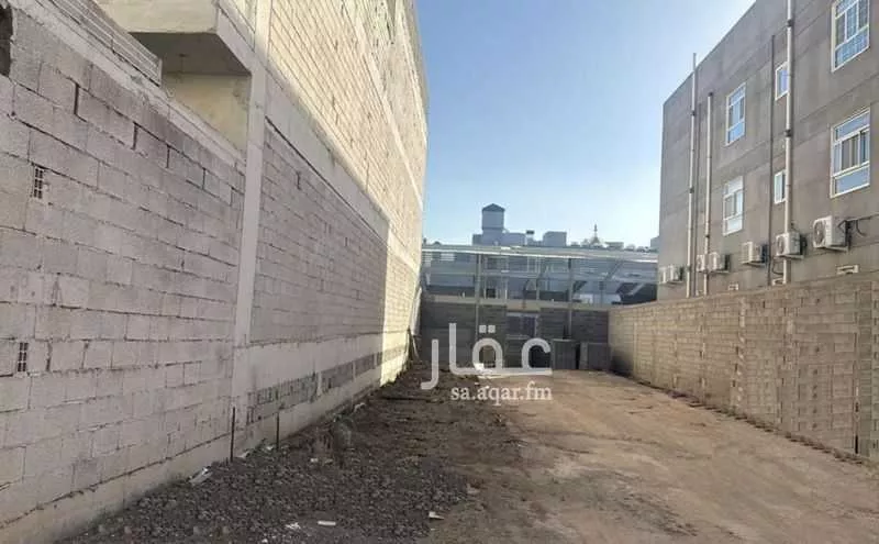 أرض للبيع في شارع محمد الكوفي, حي الرانوناء, مدينة المدينة المنورة, منطقة المدينة المنورة 1 صورة