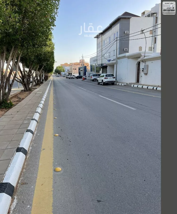 عمارة للبيع في شارع الملك فهد ابن عبدالعزيز سعود, حي المنتزة, مدينة عيون الجواء, منطقة القصيم صورة 4