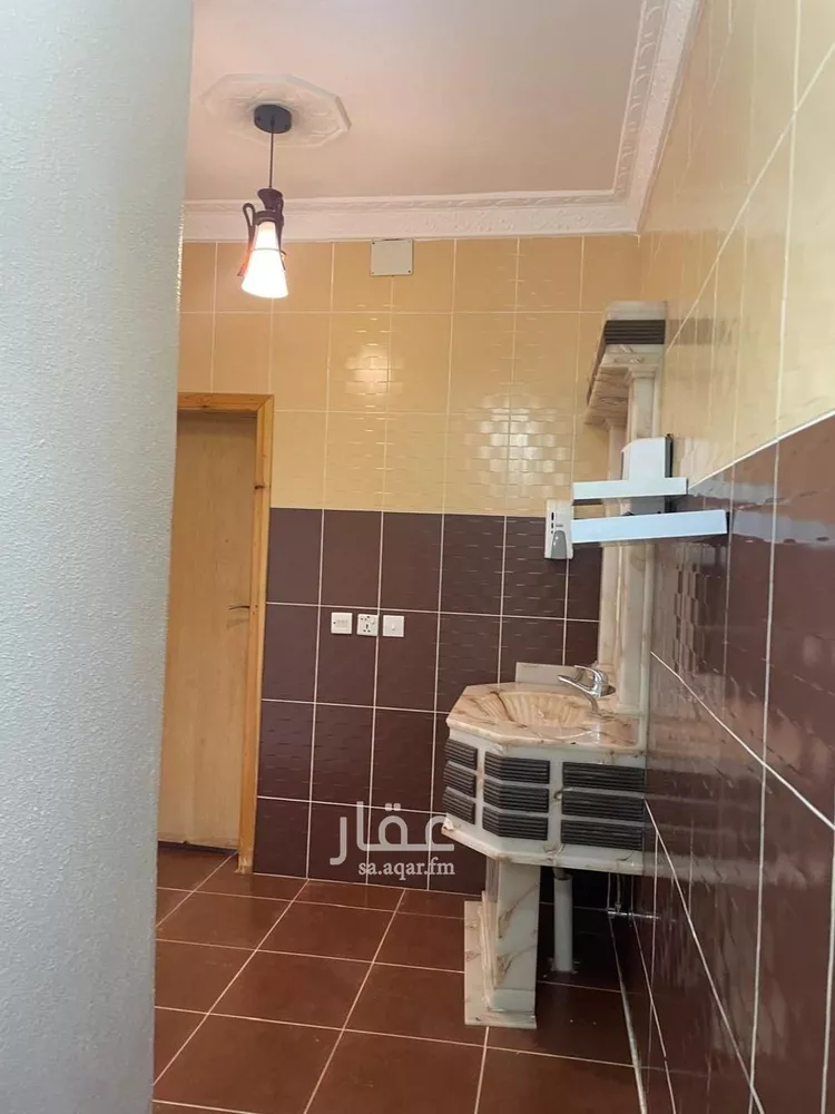 عمارة للبيع في شارع عامر ابن امية, حي الشرفية, مدينة خميس مشيط, منطقة عسير 34